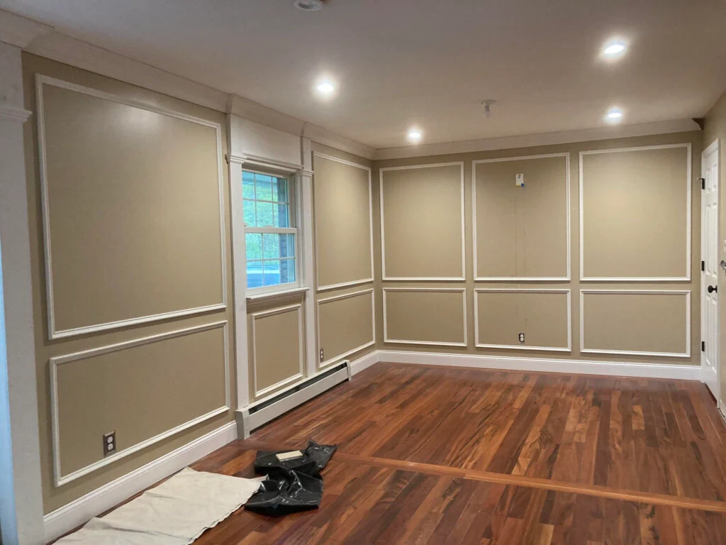Wall paneling installation in Monmouth County NJ with picture-frame molding